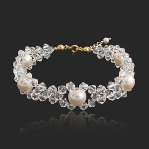 Bransoletka srebrna pozłacana z kryształkami i perłami SWAROVSKI ®